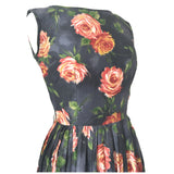 Charcoal grey vintage 1950s cotton day dress with orange and pink rose print