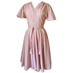 Pink cotton belted 1970s-does-1950s full circle dress with flutter sleeves