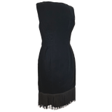 Slinky black velvet 1960s wiggle dress with fringed hem