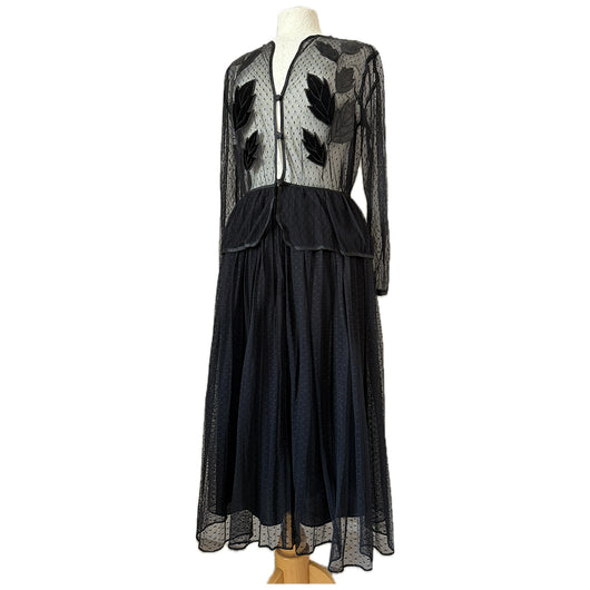 Spellbinding 1980s vintage whimsigoth black peplum midi dress by Frank Usher