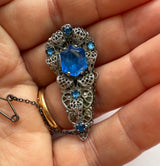 Art deco Czech glass filigree dress clip with sapphire-blue glass stones