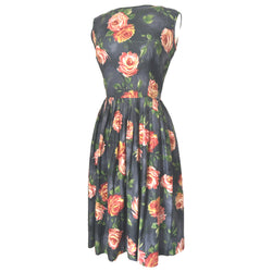 Charcoal grey vintage 1950s cotton day dress with orange and pink rose print