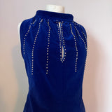 Sapphire blue velvet vintage 1960s cocktail dress with faux pearl trim