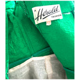 Robe de soirée hypnotique vert émeraude des années 1950 avec nœud à la hanche