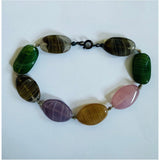 Vintage strand bracelet of colourful lampwork glass beads