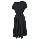 Black velvet trim vintage 1950s cocktail dress