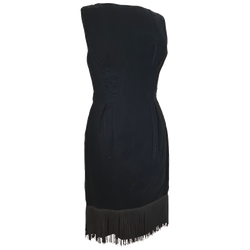 Slinky black velvet 1960s wiggle dress with fringed hem